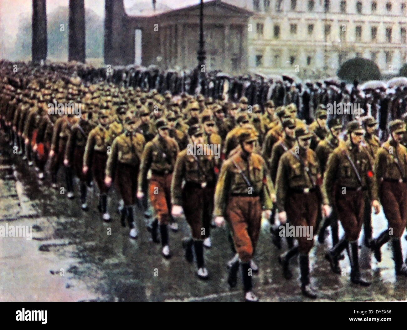 Nazi SA brownshirts march through the Brandenburg Gate in Berlin, Germany circa 1933 Stock Photo