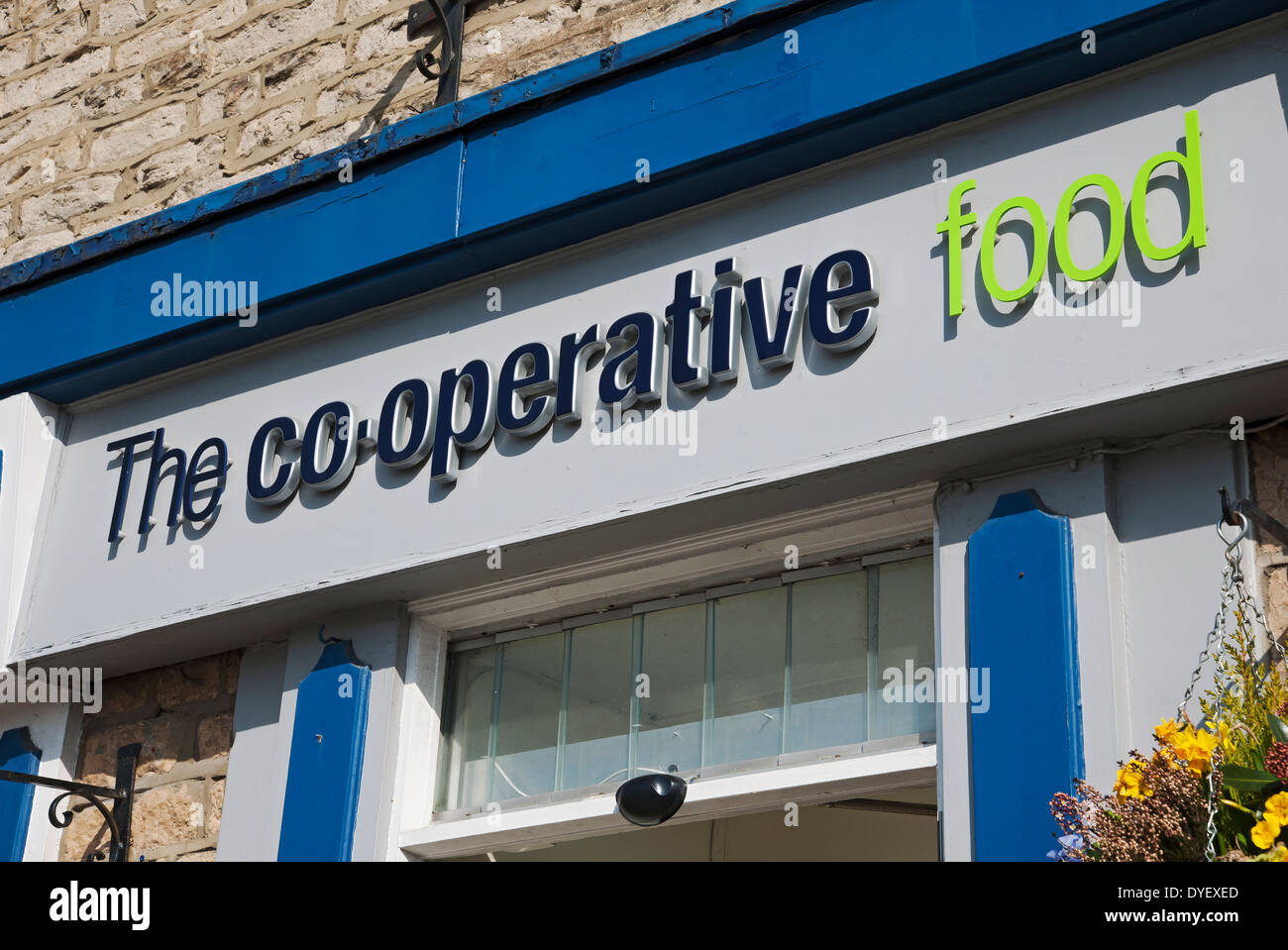 Close up of the Co-operative food shop store sign signage exterior Market Place Helmsley North Yorkshire England UK United Kingdom GB Great Britain Stock Photo