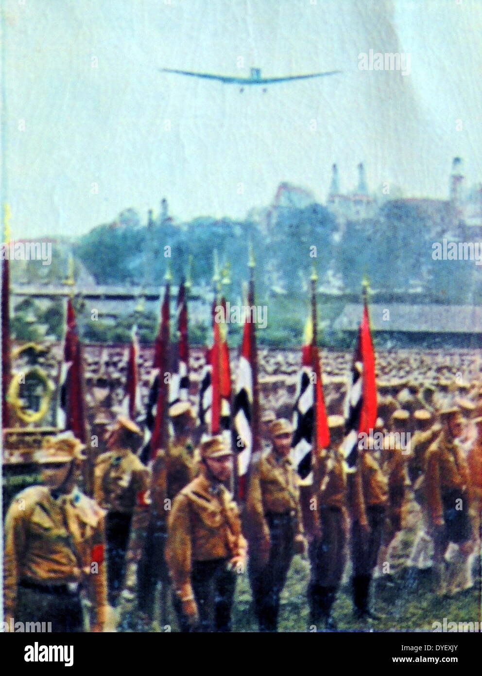 Nazi uniformed members await the arival of Adolf Hitler's plane circa 1933 Stock Photo