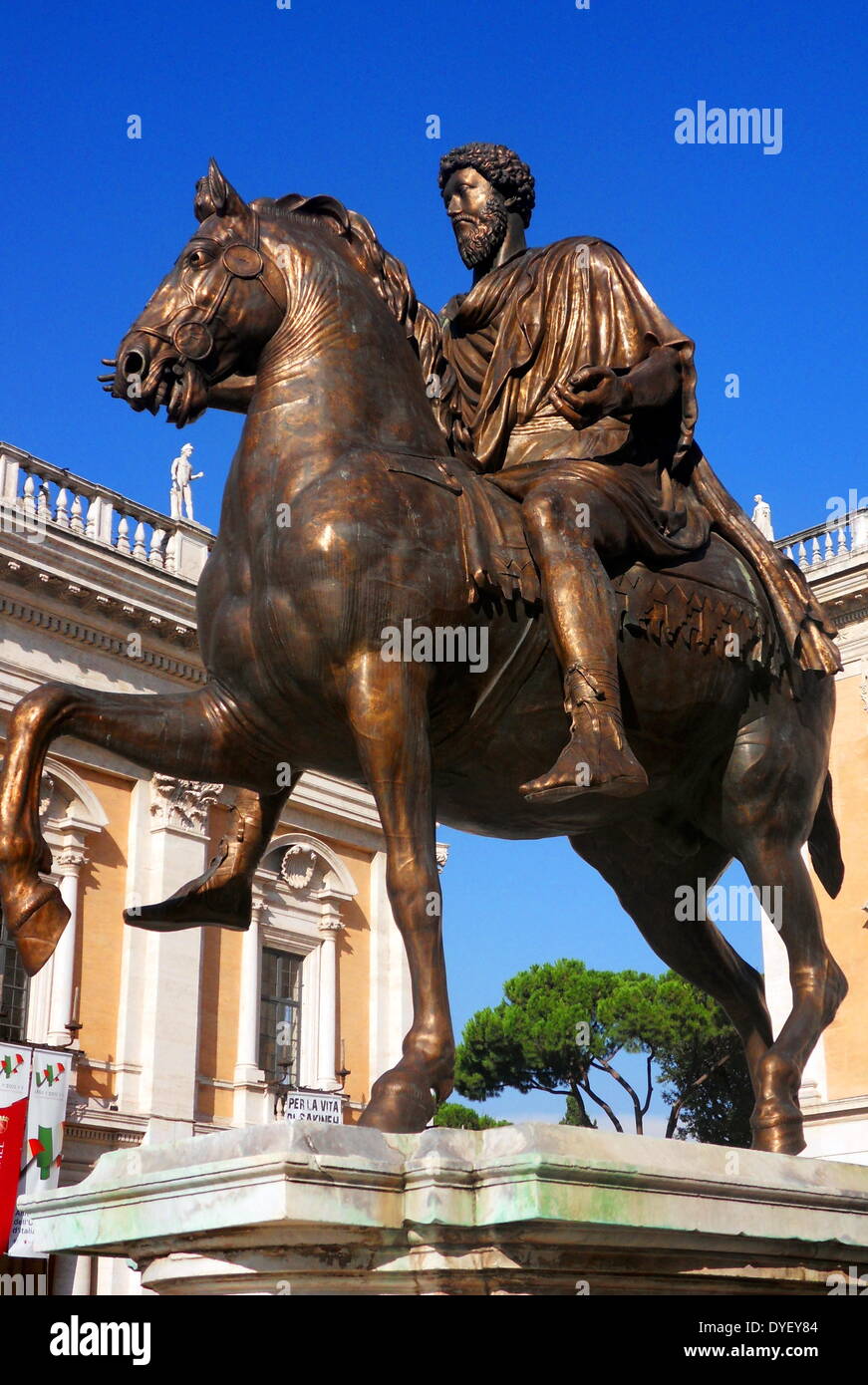 Sculptural detail from the entrance/courtyard to the Capitolini museums, in Rome, Italy. The statue is a bronze of Marcus Aurelius on a horse. The museums themselves are contained within 3 palazzi as per designs by Michelangelo Buonarroti in 1536, they were then built over a 400 year period. Stock Photo