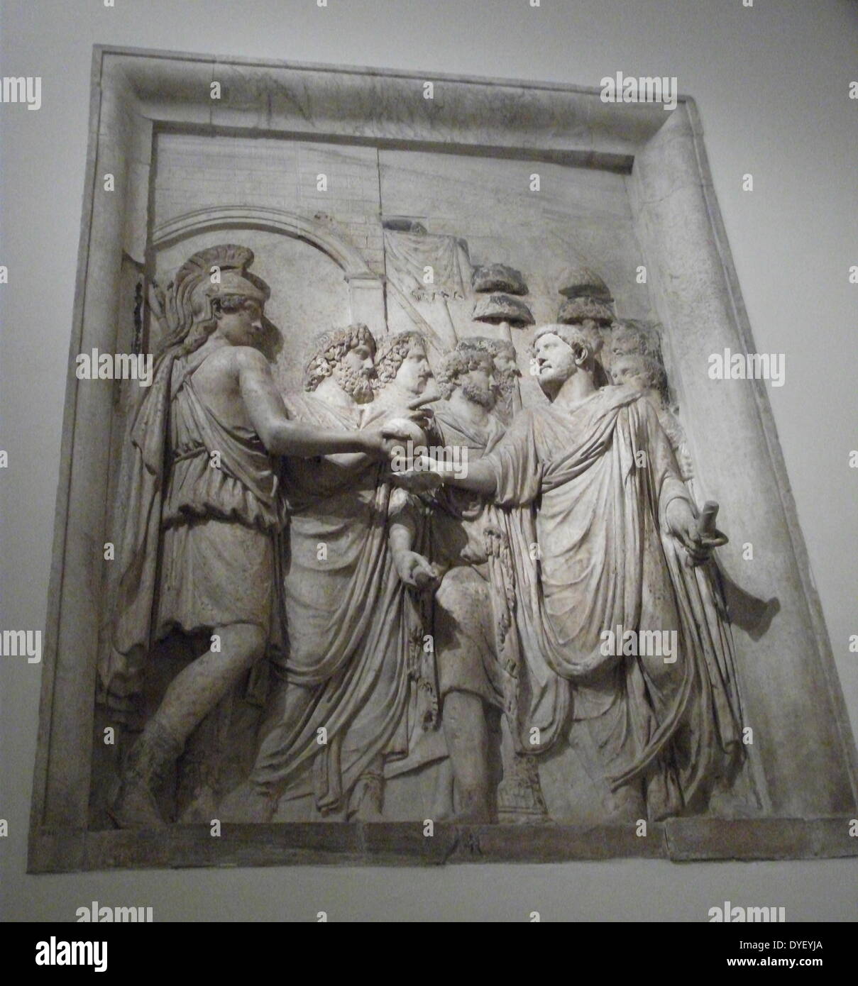 Relief depicting imperial triumph. This panel shows the Roman Emperor amongst the people. Roman, Circa 2nd century AD. Stock Photo