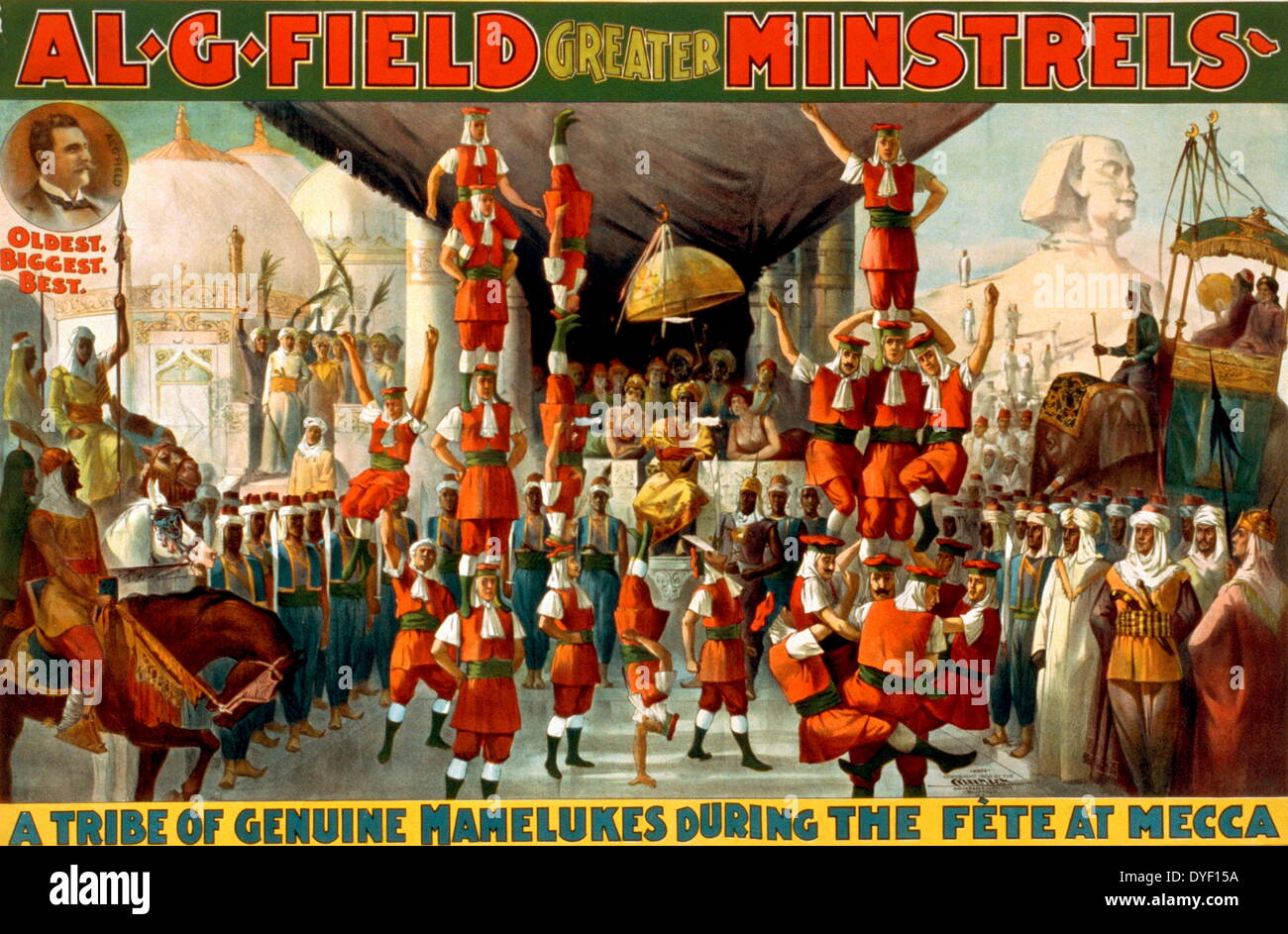 Vaudeville style painted poster advertising Al. G. Field's Greater Minstrels, described as 'A Tribe of Genuine Mamelukes during the fete at mecca'. The image shows them performing acrobatic balancing feats. Circa late 19th-Early 20th century. Stock Photo
