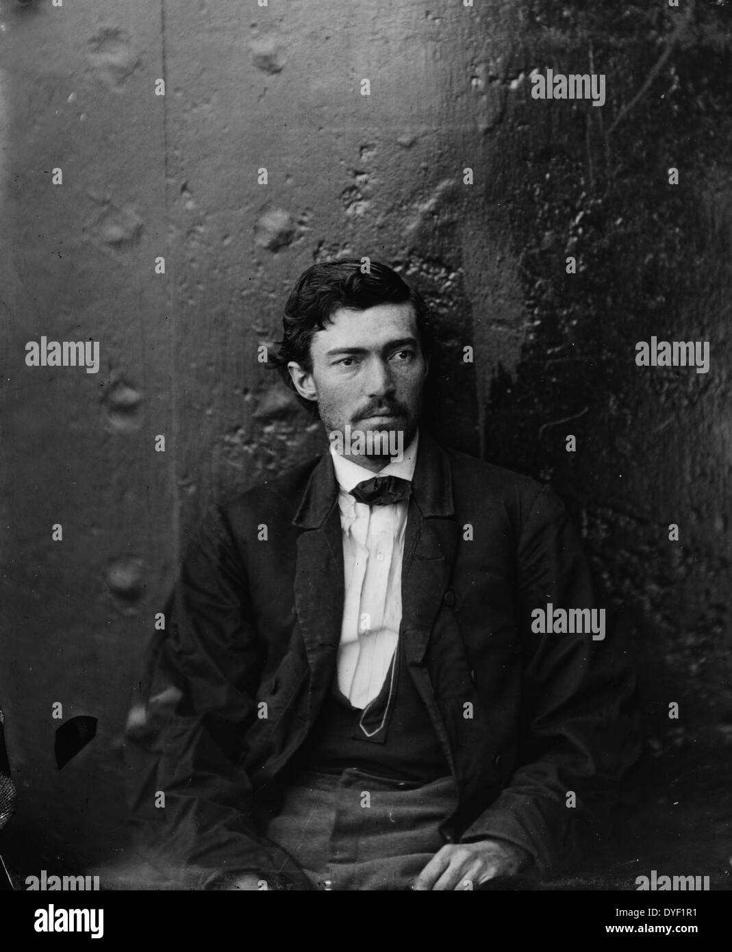 Samuel Bland Arnold (September 6, 1834 – September 21, 1906) was involved in the plot to kidnap President Abraham Lincoln in 1865. He and the other conspirators, John Wilkes Booth, David Herold, Lewis Powell, Michael O'Laughlen and John Surratt, were to kidnap Lincoln and hold him to exchange for the Confederate prisoners in Washington D.C. This photograph has backgrounds of dark metal, and was presumably taken on the monitors, U.S.S. Montauk and Saugus, where the conspirators were for a time confined. Stock Photo