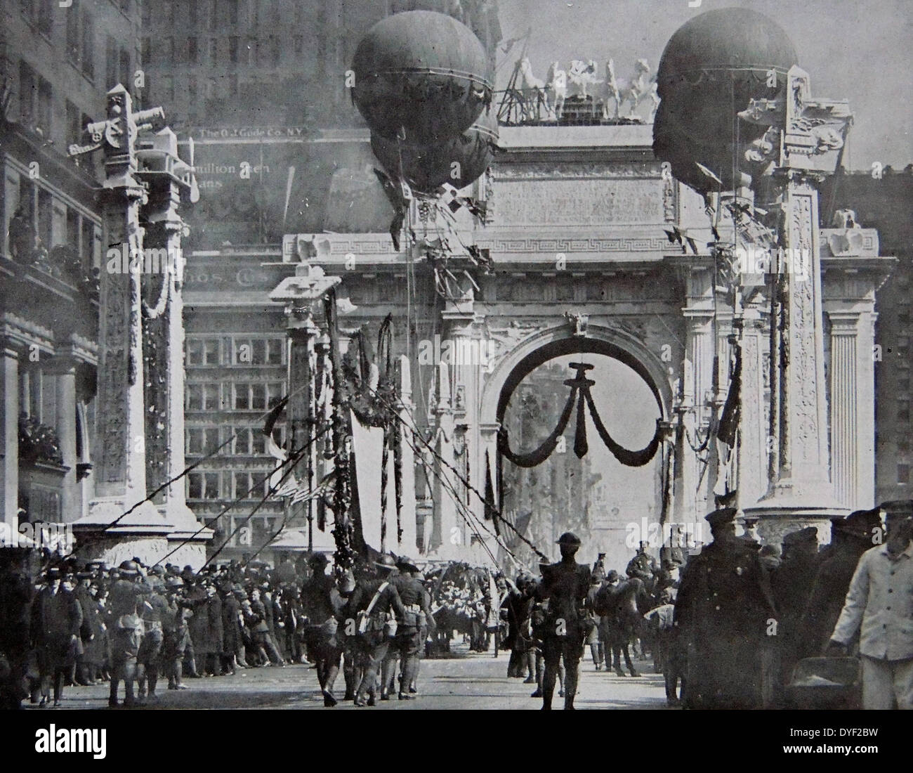 American troops marching under a Victory Arch in New York, to mark their return from World war one. Stock Photo