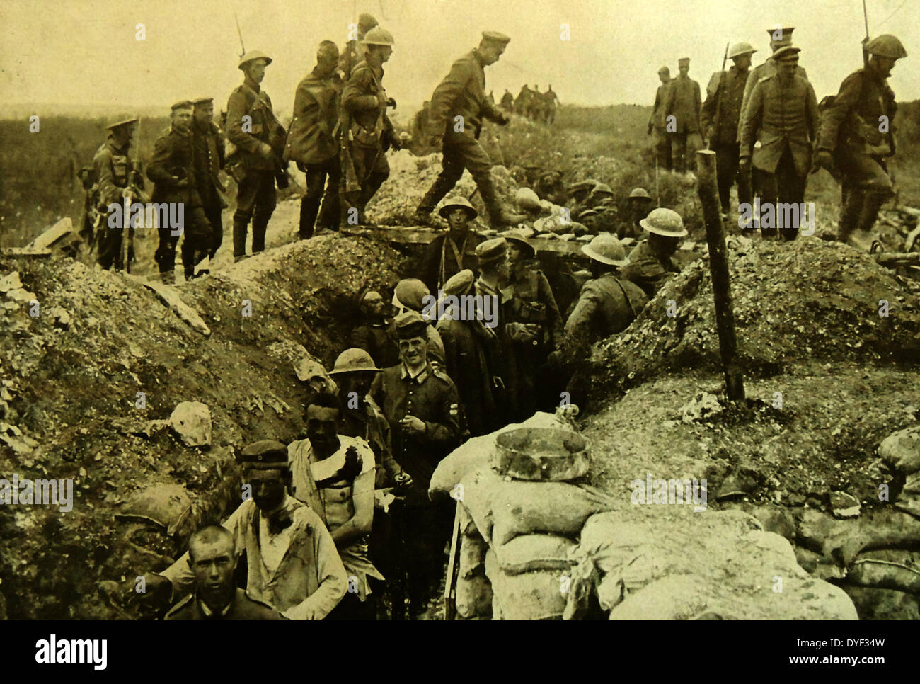 German prisoners of war in France, marched through trenches by advancing British forces, during world war one. 1915 Stock Photo