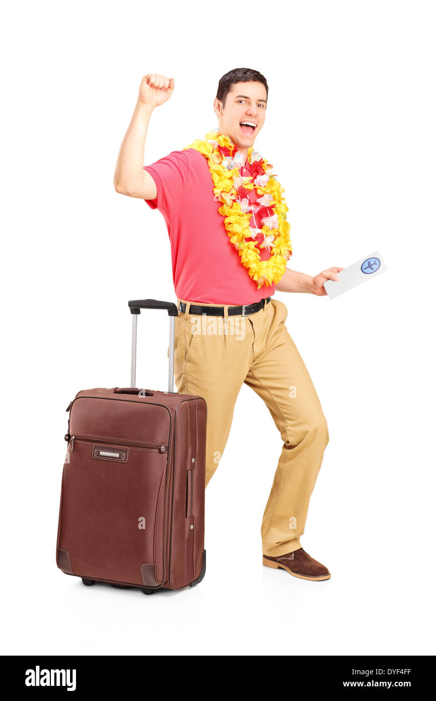Man holding a plane ticket and gesturing happiness Stock Photo
