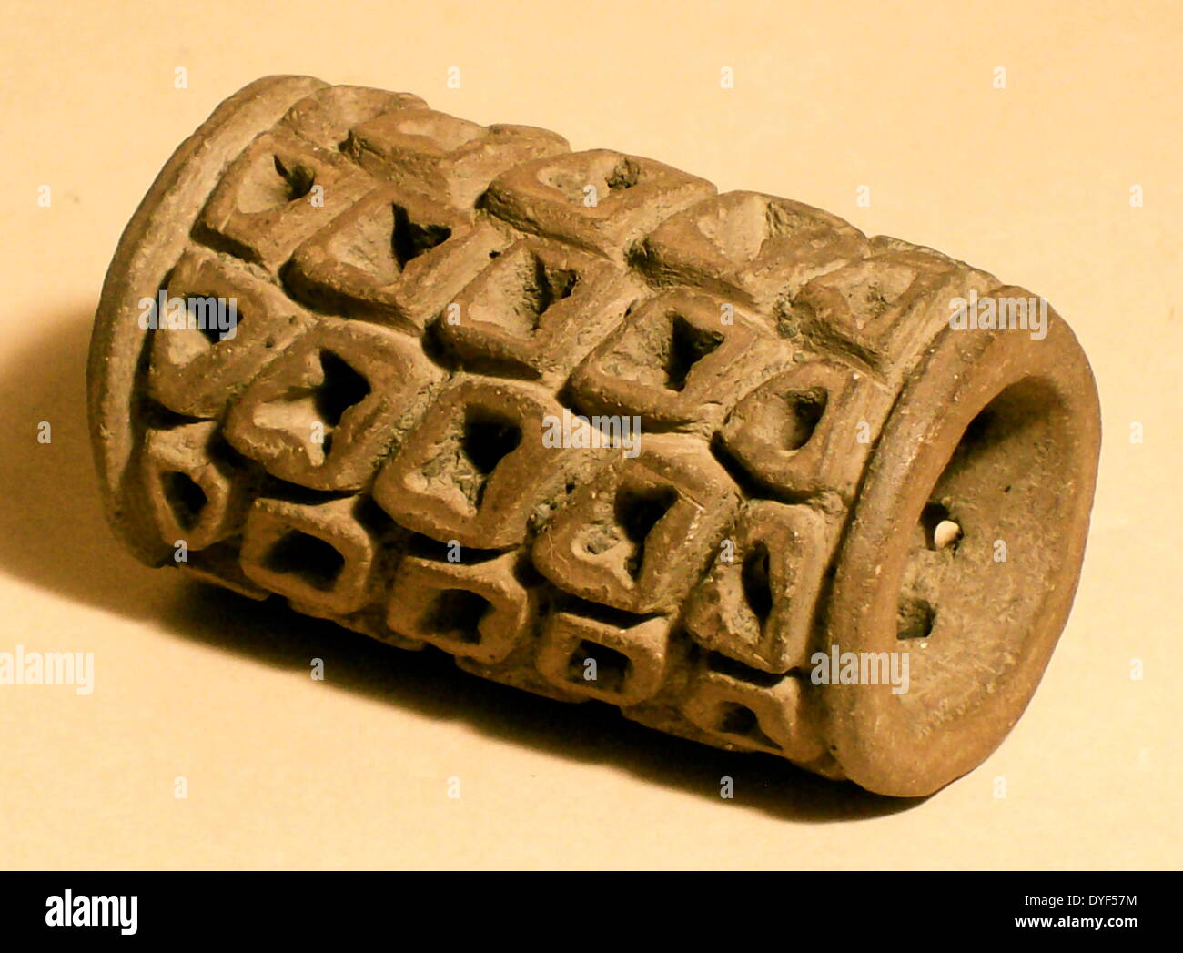 Perforated pottery tube from the Roman Baths at Bath. Designed to disperse steam through ts apertures. Stock Photo