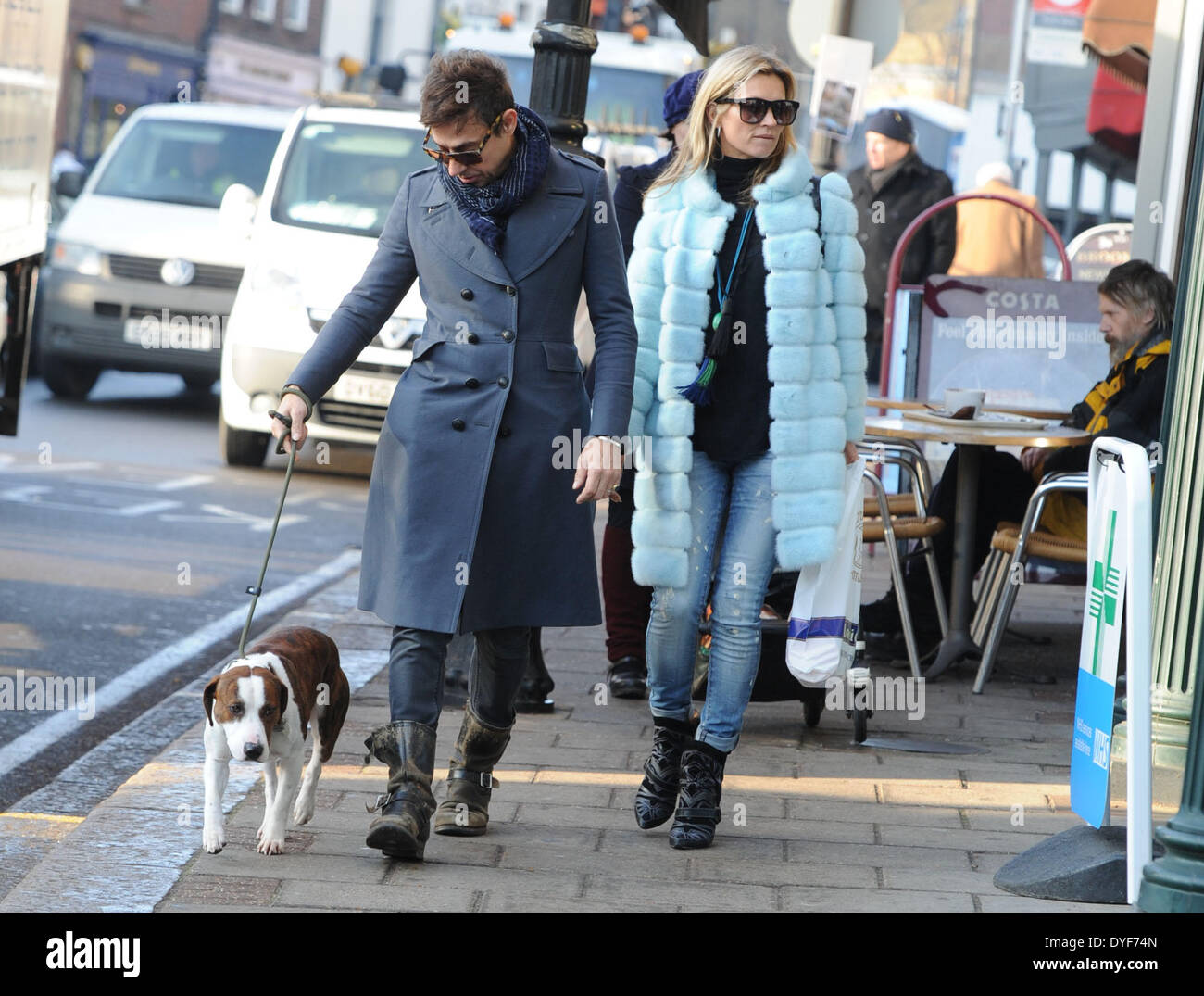 Kate Moss and Jamie Hince walking their dog Archie in HighgateFeaturing: Kate Moss,Jamie Hince,Archie Where: London United KingdomWhen: 12 Dec 2012 Stock Photo