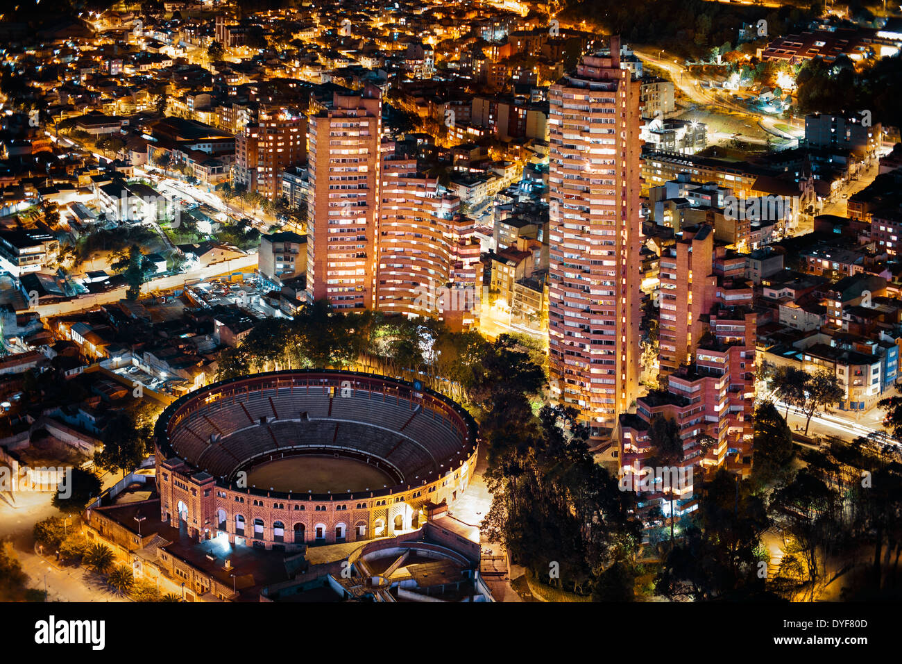 Santamaría Bullring (Plaza de Toros de Santamaría) in Bogotá, Colombia. Aerial view at night. Stock Photo
