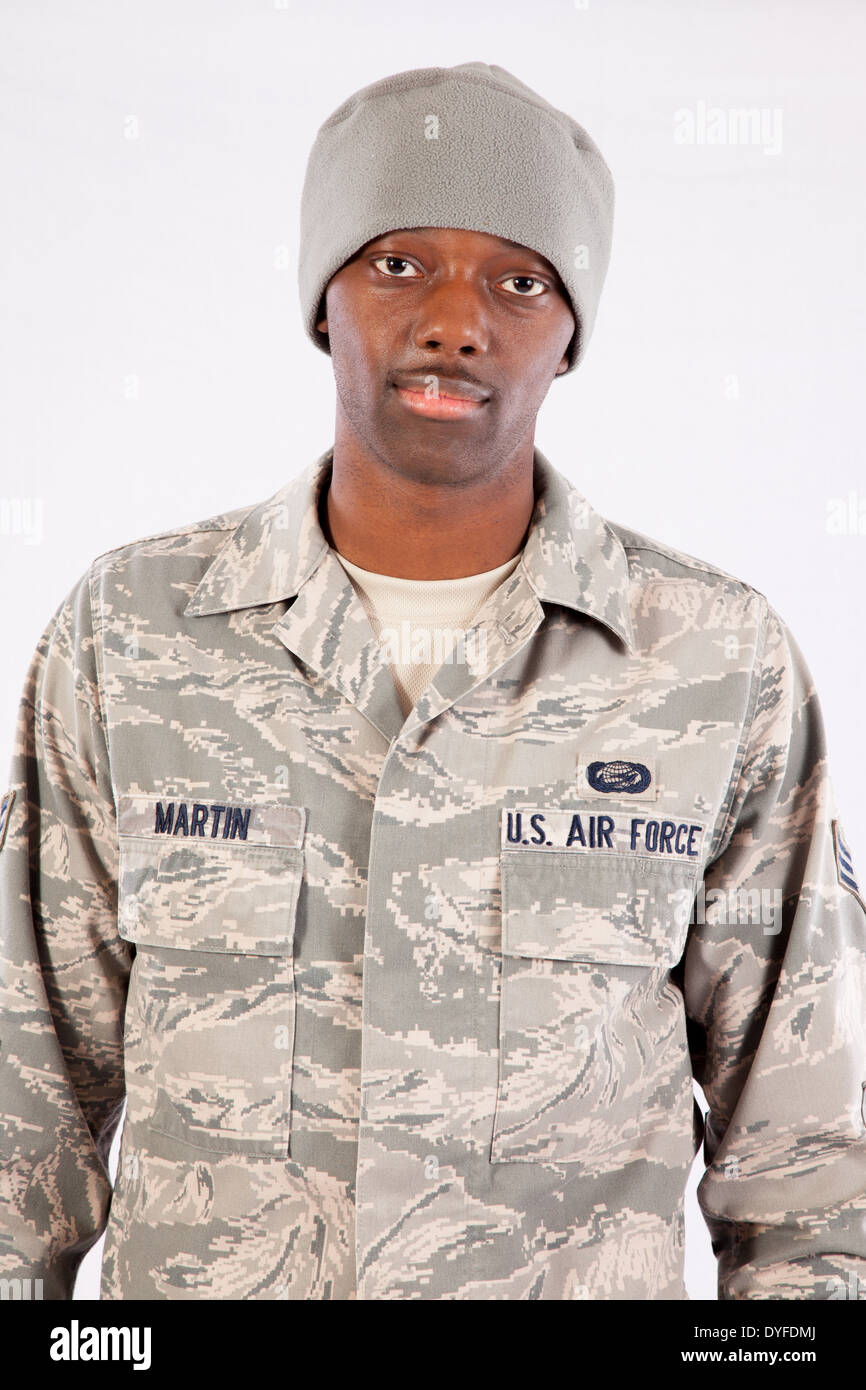 Black man in U.S. Air Force camouflage,fatigues, standing and looking at the camera with a smile Stock Photo