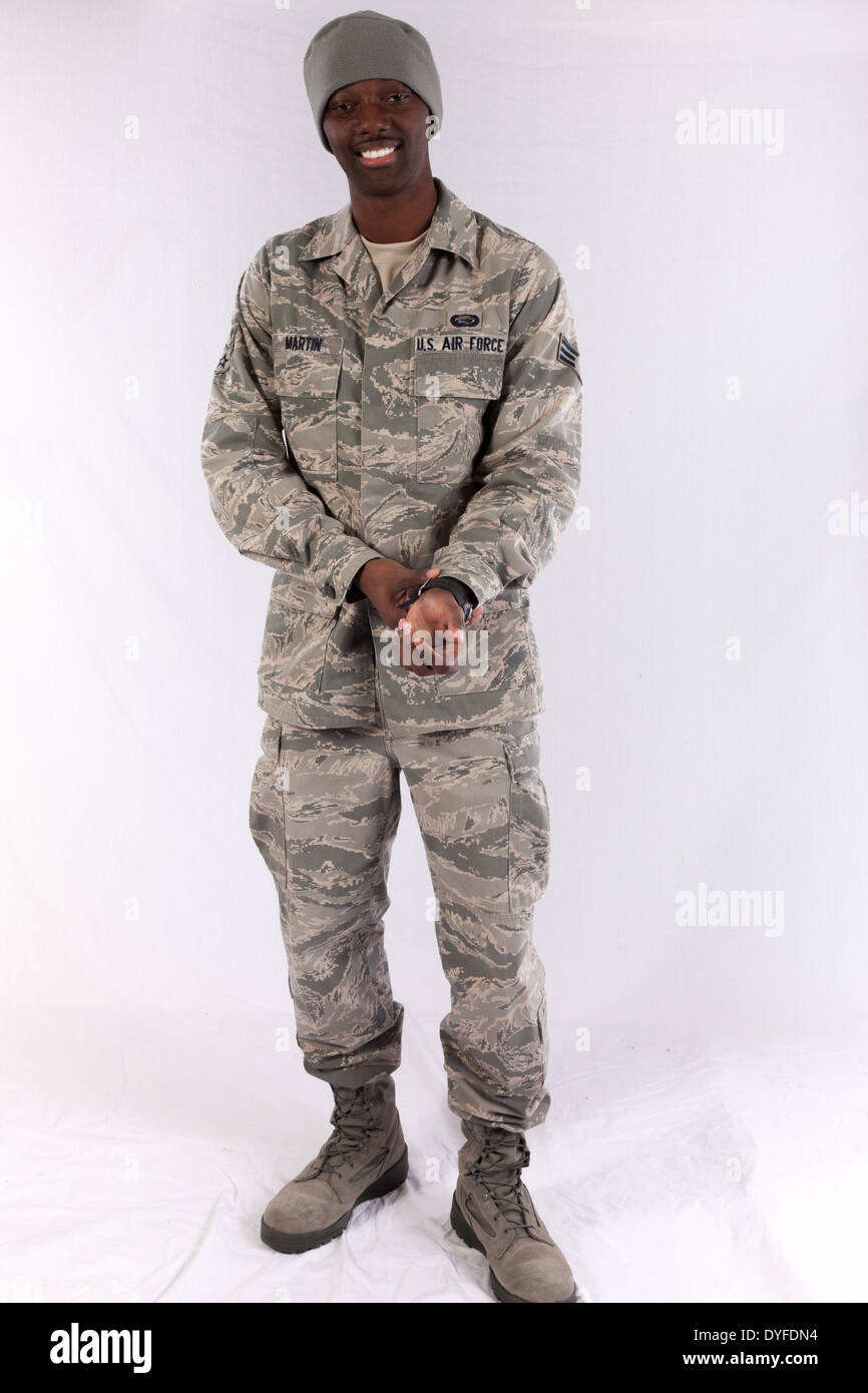 Black man in U.S. Air Force camouflage,fatigues, standing and looking at the camera with a smile Stock Photo