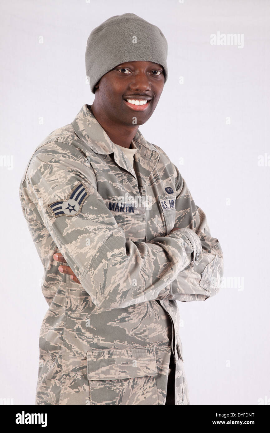 Black man in U.S. Air Force camouflage,fatigues, standing and looking at the camera with a smile Stock Photo