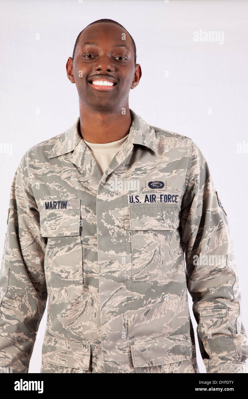 Black man in U.S. Air Force camouflage,fatigues, standing and looking at the camera with a  smile Stock Photo