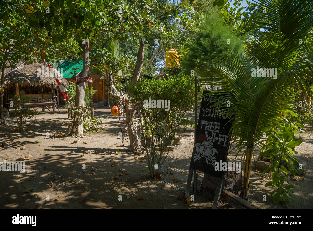 Locals bars restaurant with trees on the beach with free wi-fi Nusa Lembongan Thailand Stock Photo