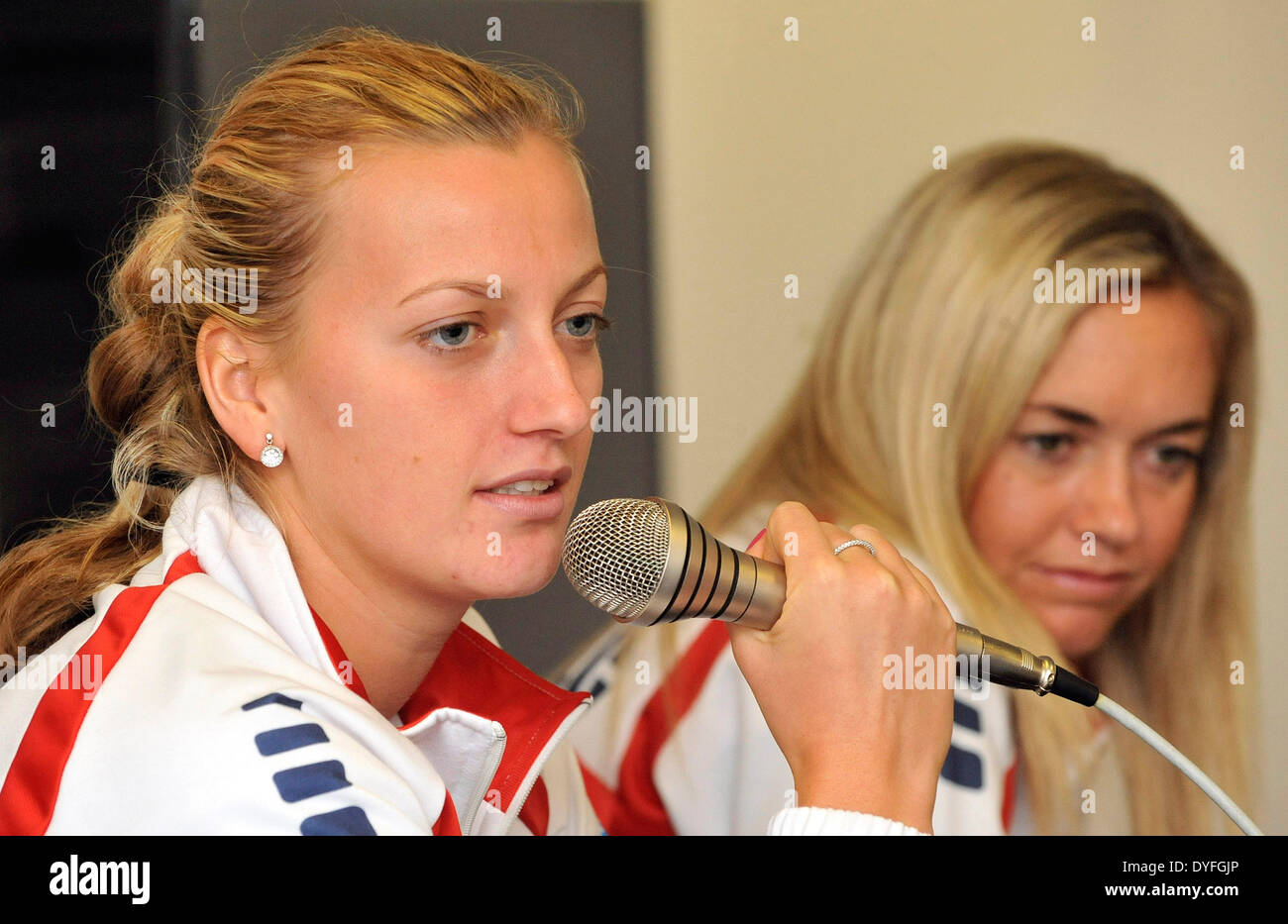 Ostrava, Czech Republic. 16th Apr, 2014. Czech tennis players Petra Kvitova (left) and Klara Koukalova are seen during a press conference prior to the Fed Cup semifinal match Czech Republic vs Italy in Ostrava, Czech Republic, April 16, 2014. © Jaroslav Ozana/CTK Photo/Alamy Live News Stock Photo