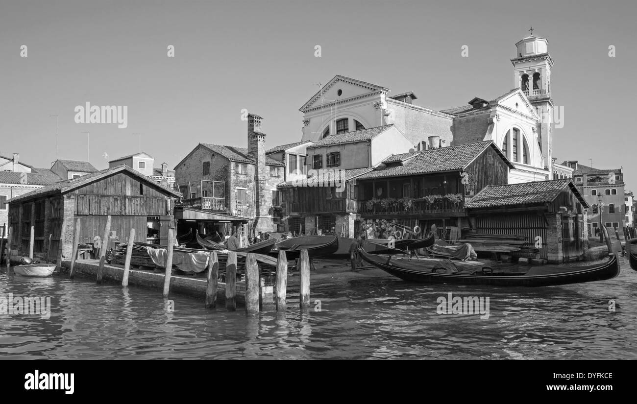 VENICE, ITALY - MARCH 13, 2014: Dock for repair of gondolas near church Chiesa San Sebastiano. Stock Photo