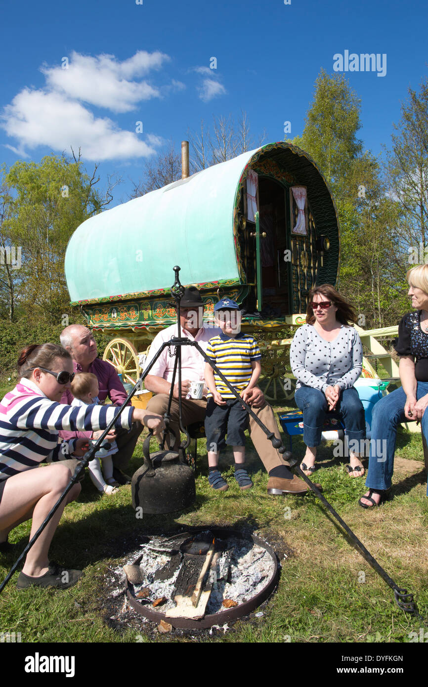 Romany Gypsies outside their Vardo, Gypsy and Traveller site, West
