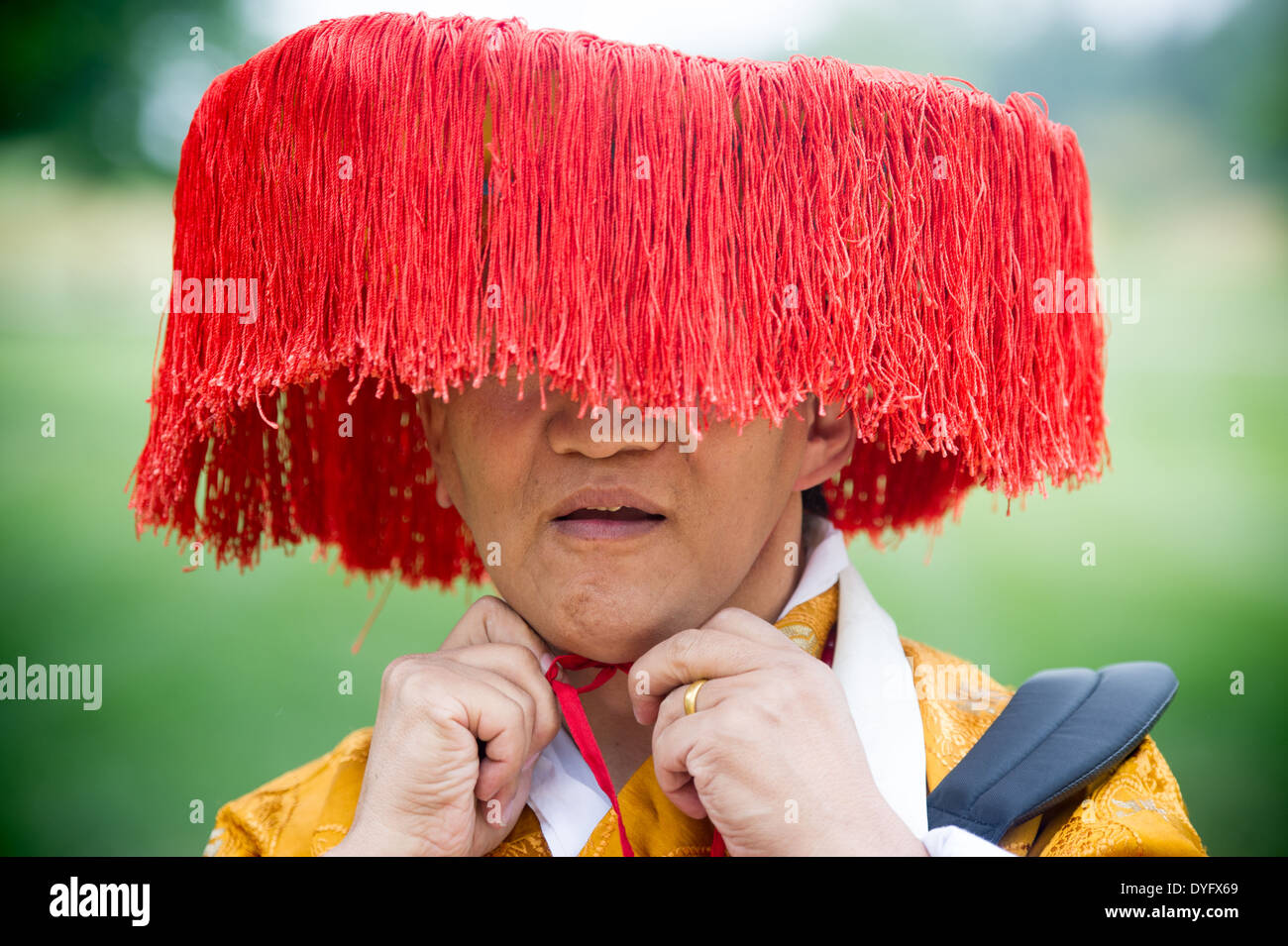 Tibetan Man in traditional dress Stock Photo