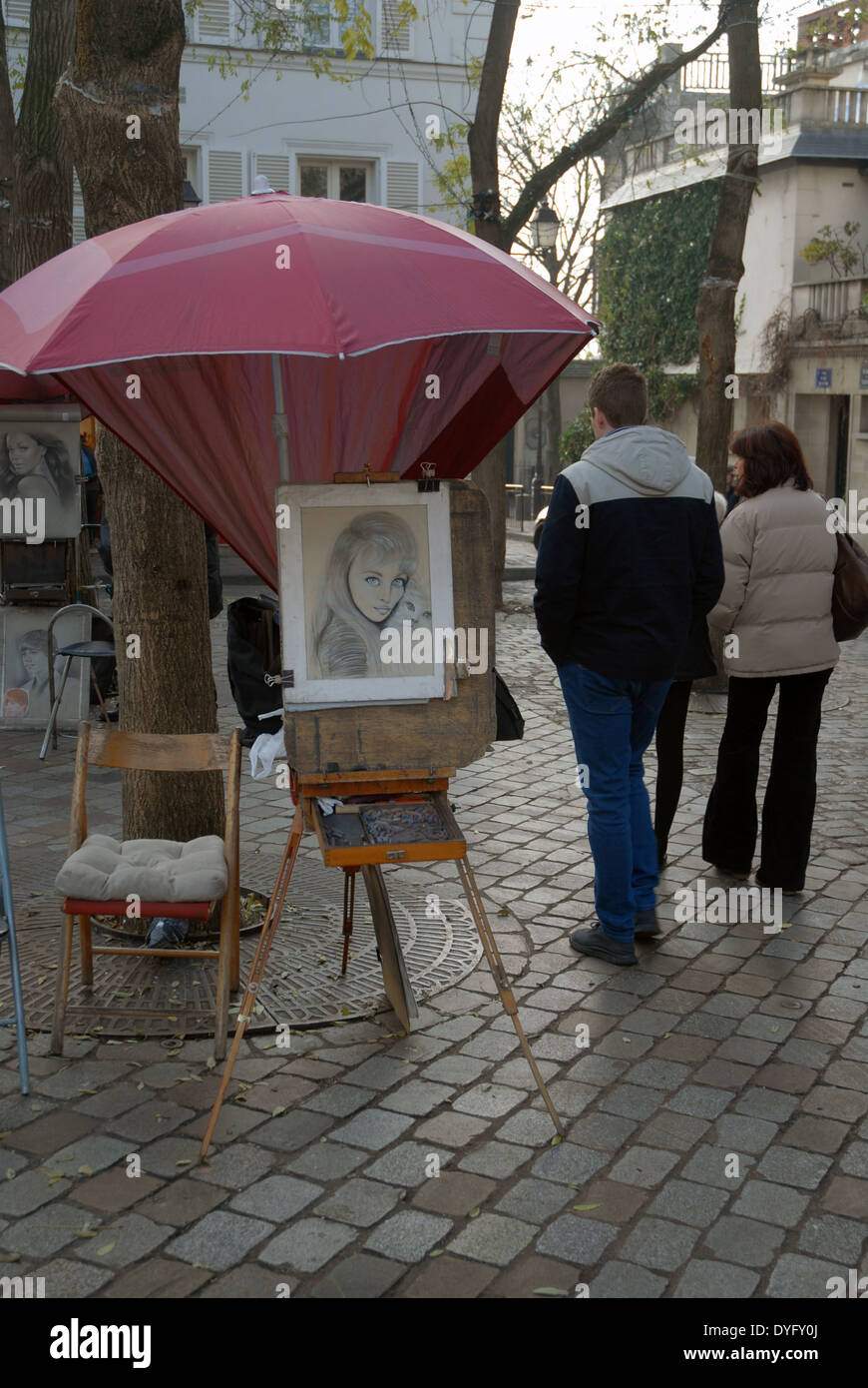 Artists drawing and painting on their easels, Place du Tertre, Montmartre, Paris, France. Stock Photo