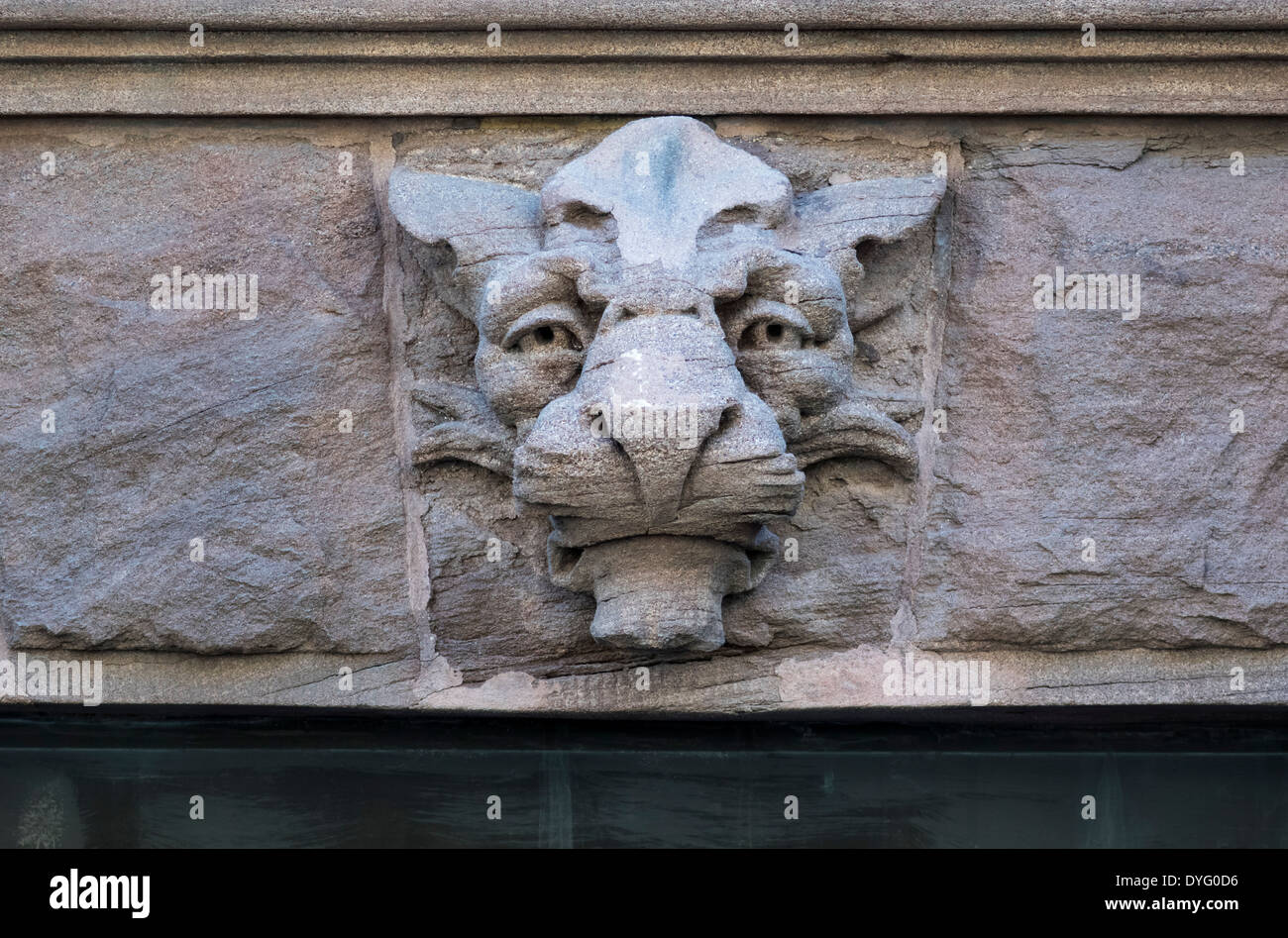 Stone carving of a lion's head on the facade of a New York City brownstone on the Upper West Side of Manhattan Stock Photo