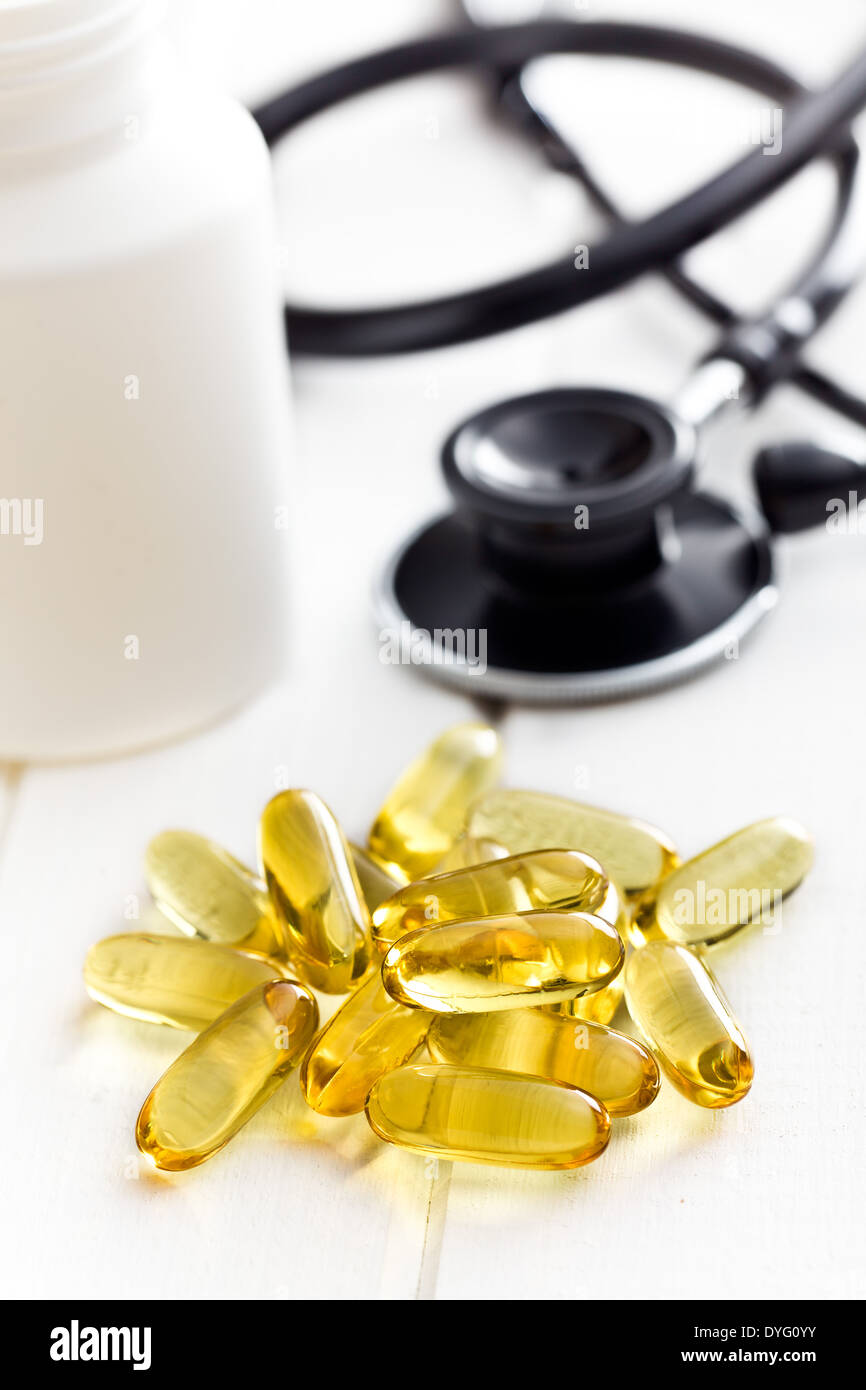 Cod liver oil. Gel capsules and stethoscope Stock Photo Alamy