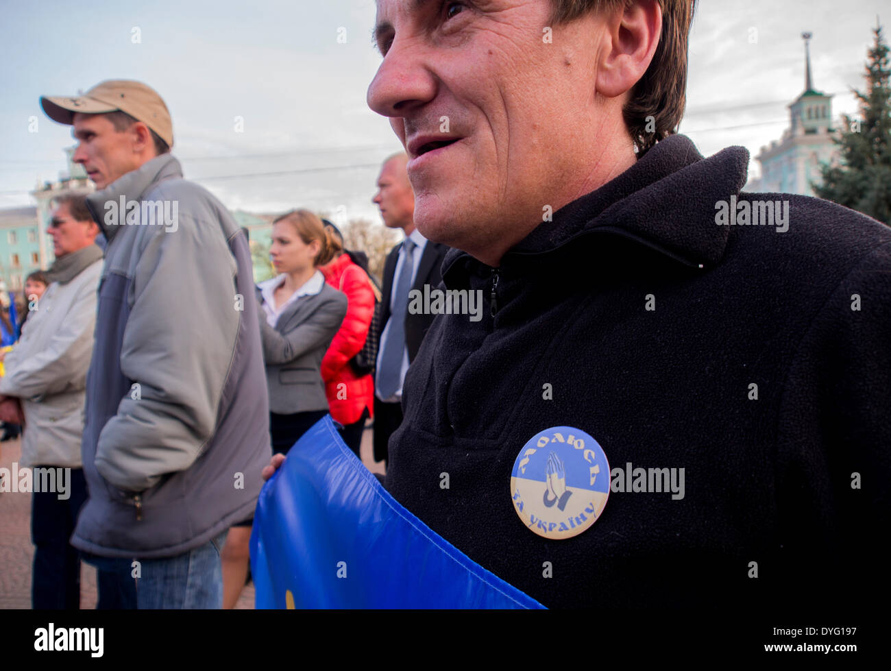 Luhansk, Ukraine. 17th April, 2014. Ukrainian patriot with a badge that says 'Pray for Ukraine' during the rally 'For United Ukraine' Credit:  Igor Golovnov/Alamy Live News Stock Photo