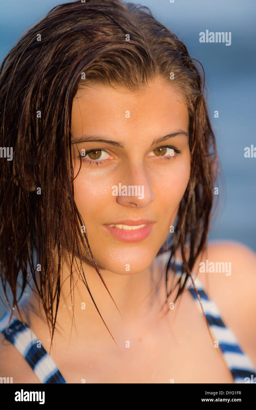 Teenage girl at the beach Stock Photo