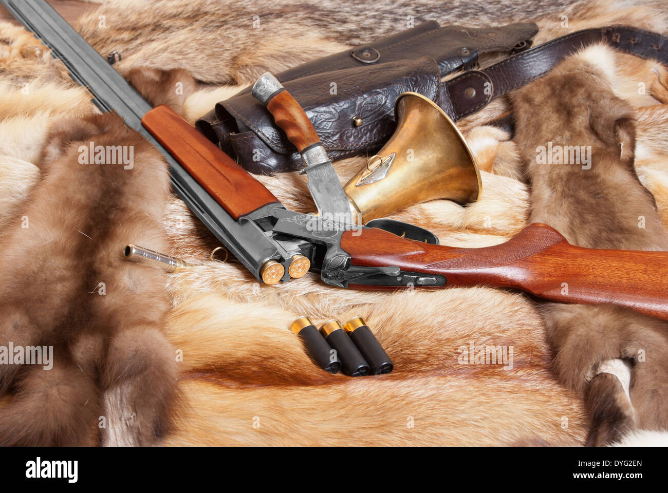 Hunting things on background of the fur Hunting things on background of the fur Stock Photo