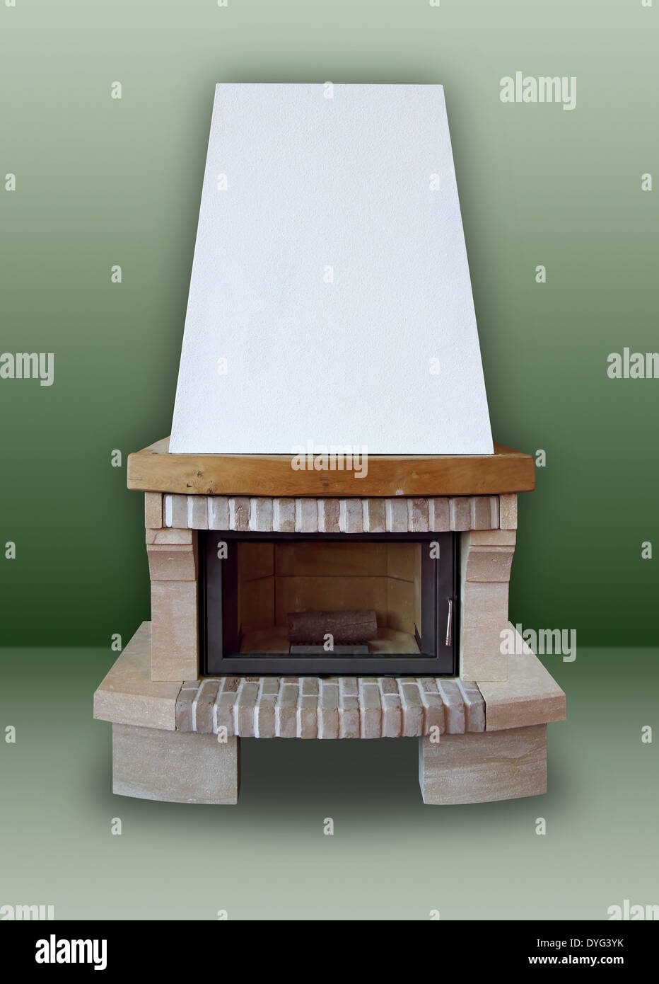 Fireplace made of brick and stone, with white chimney on a green background Stock Photo