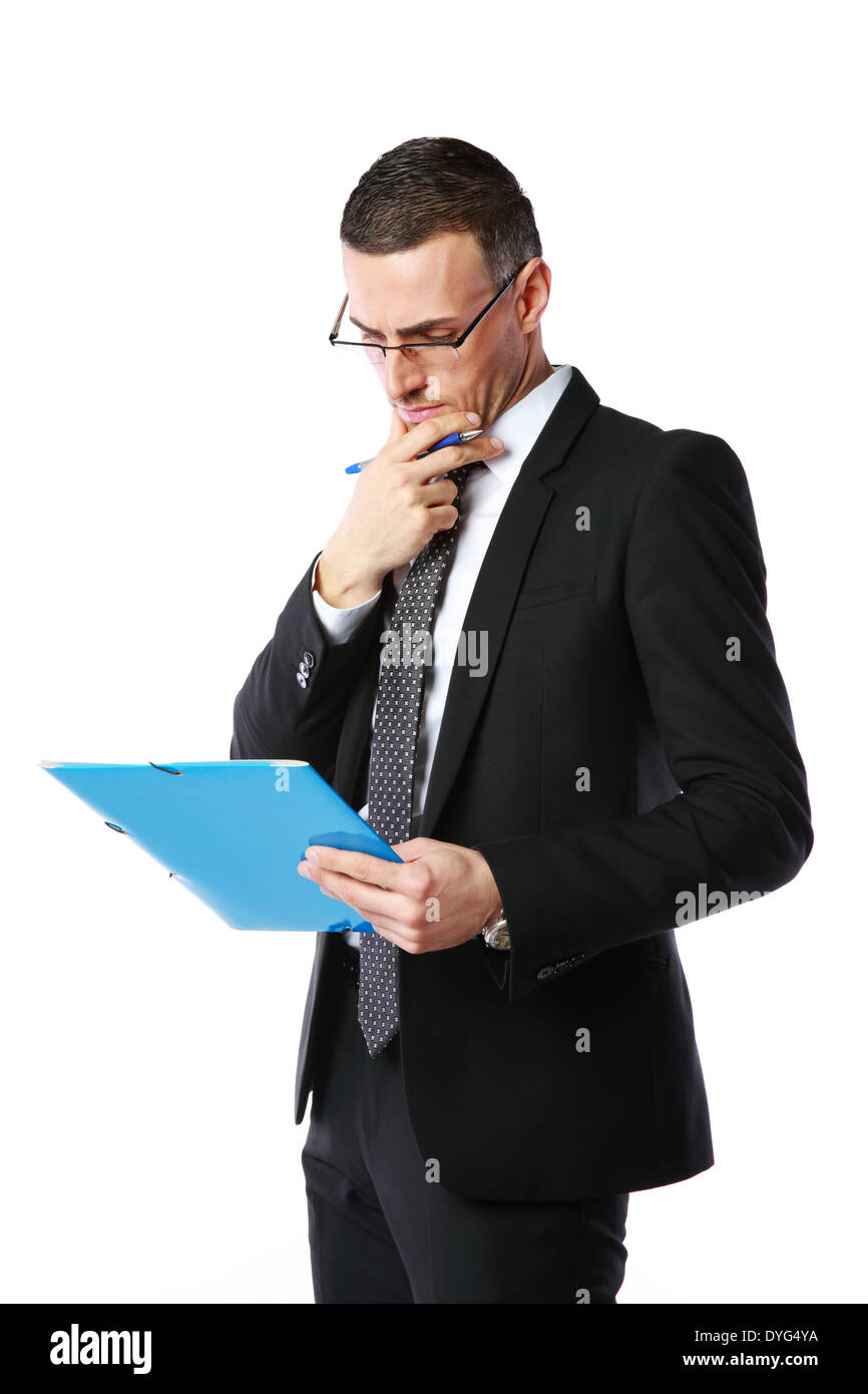 Handsome businessman reading document over white background Stock Photo