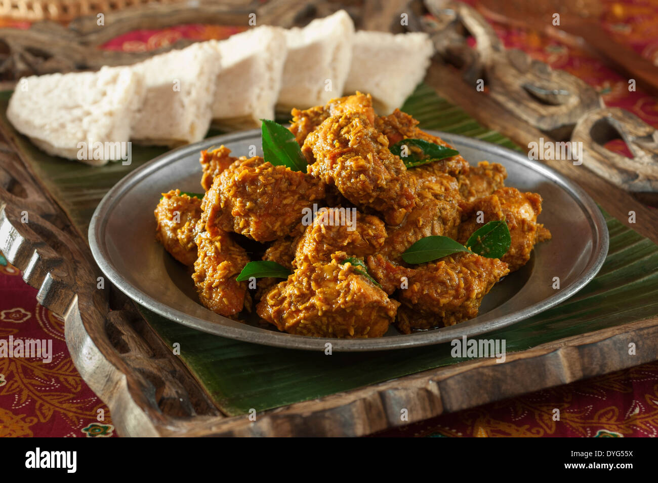 Chicken Sukka. Mangalore style dry coconut curry with neer dosas Stock  Photo - Alamy