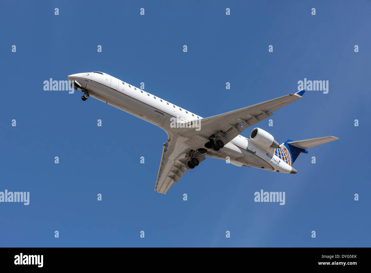 A Bombardier CRJ of United Airlines on final approach Stock Photo Alamy