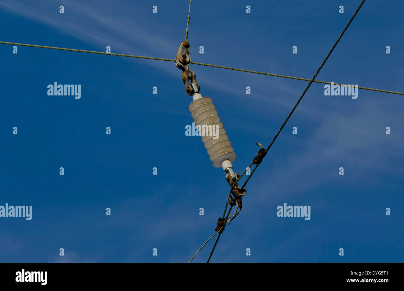 Insulator in wire net of railway Stock Photo