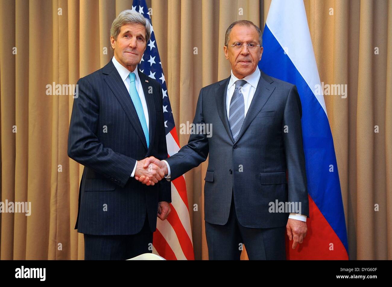 Geneva. 17th Apr, 2014. U.S. Secretary of State John Kerry (L) shakes hands with Russian Foreign Minister Sergei Lavrov during their bilateral talks before the talks on Ukraine in Geneva, Switzerland, on April 17, 2014. The European Union, Russia, United States and Ukraine started here Thursday a dialogue to seek ways to handle the on-going tensions in this Eastern European country. Credit:  Xinhua/Alamy Live News Stock Photo