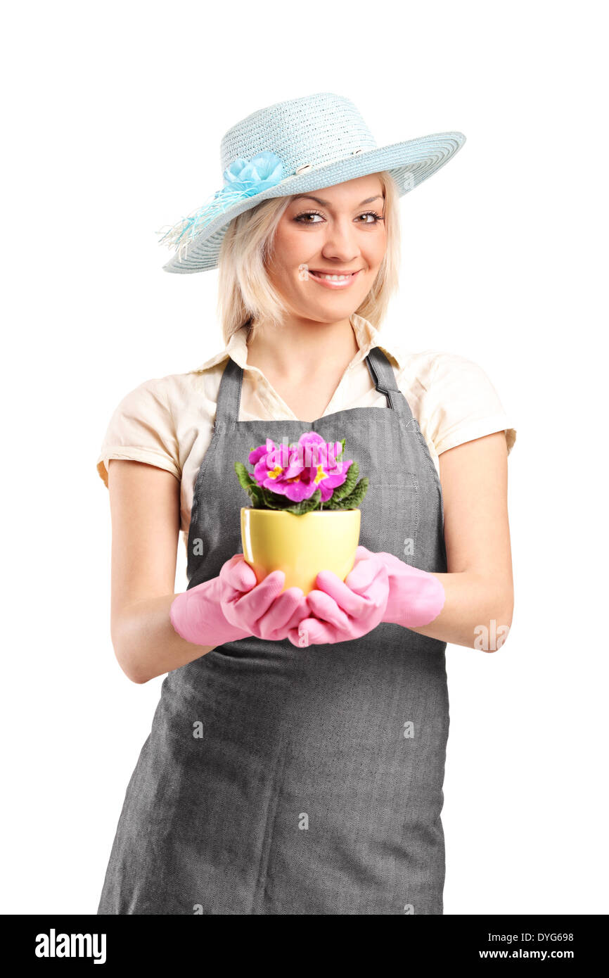 Female florist holding a plant Stock Photo