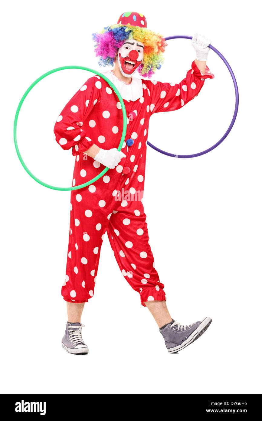 Funny clown holding two hula hoops Stock Photo