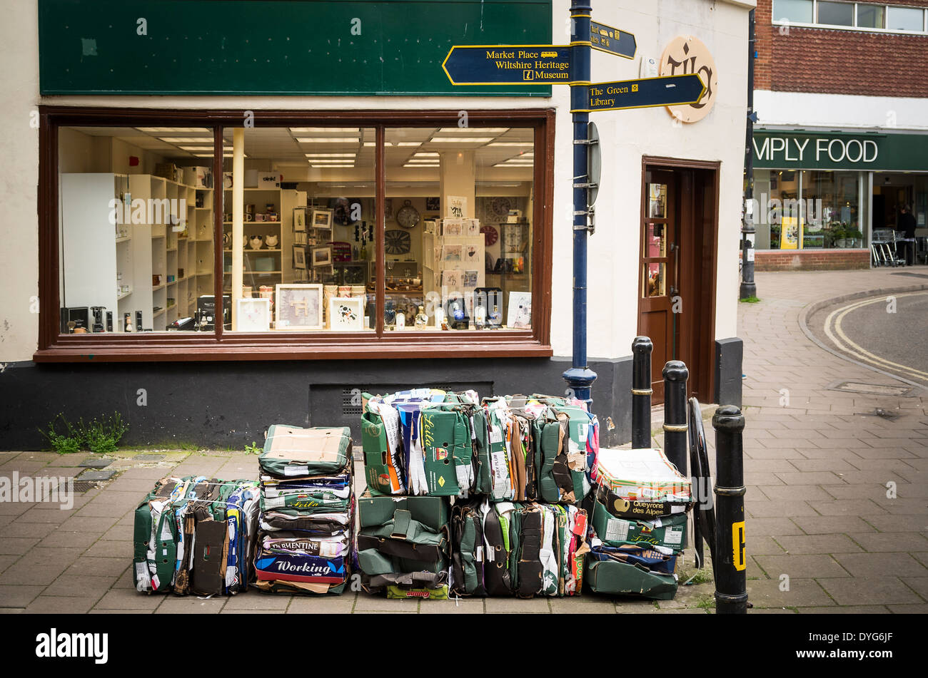Empty cartons compacted and packed ready for collection in an English
