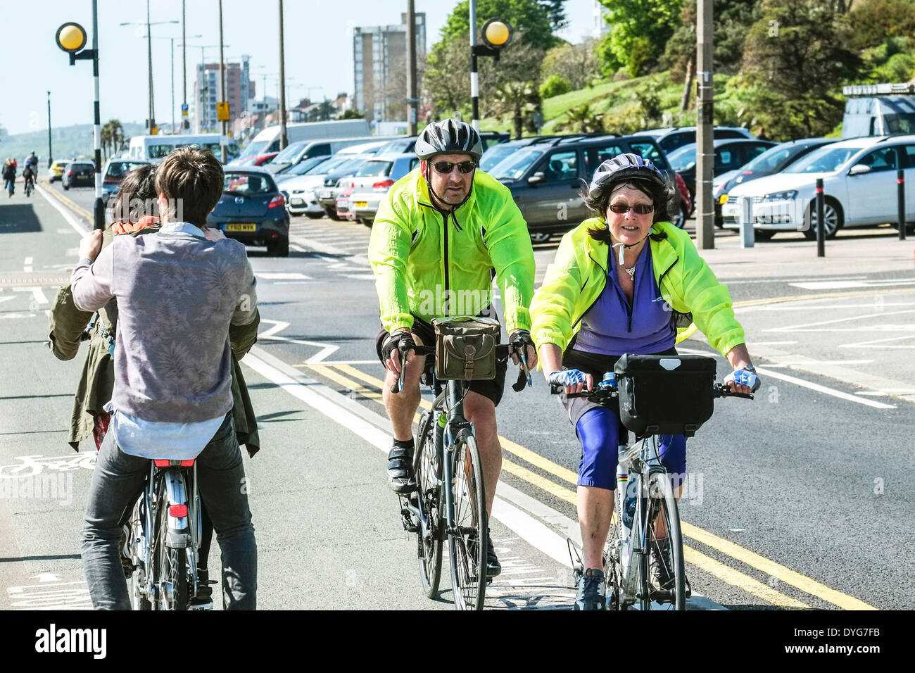 People cycling along the cycle lane in Southend. Stock Photo