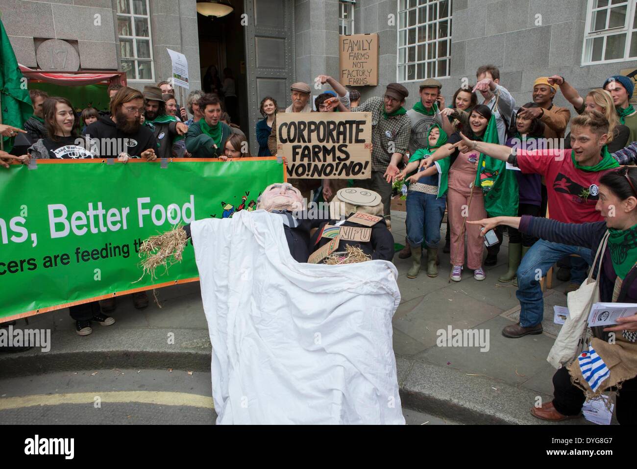 Landworkers Alliance demo outside DEFRA  headquarters to draw attention to the unhealthy relationship of large Agri Business to UK government. Stock Photo