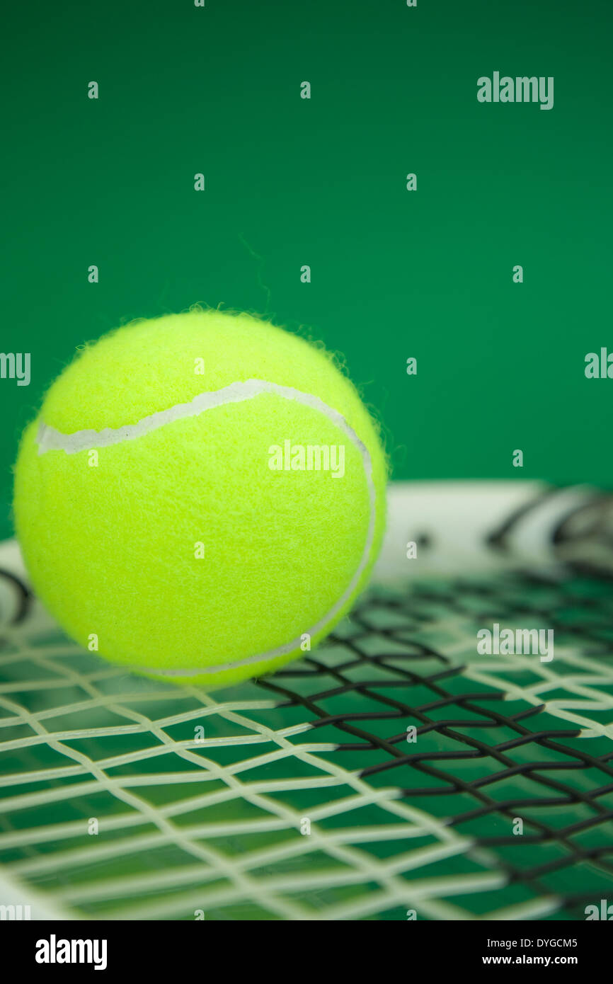 Tennis ball on a Carbon Graphite tennis racket Stock Photo Alamy