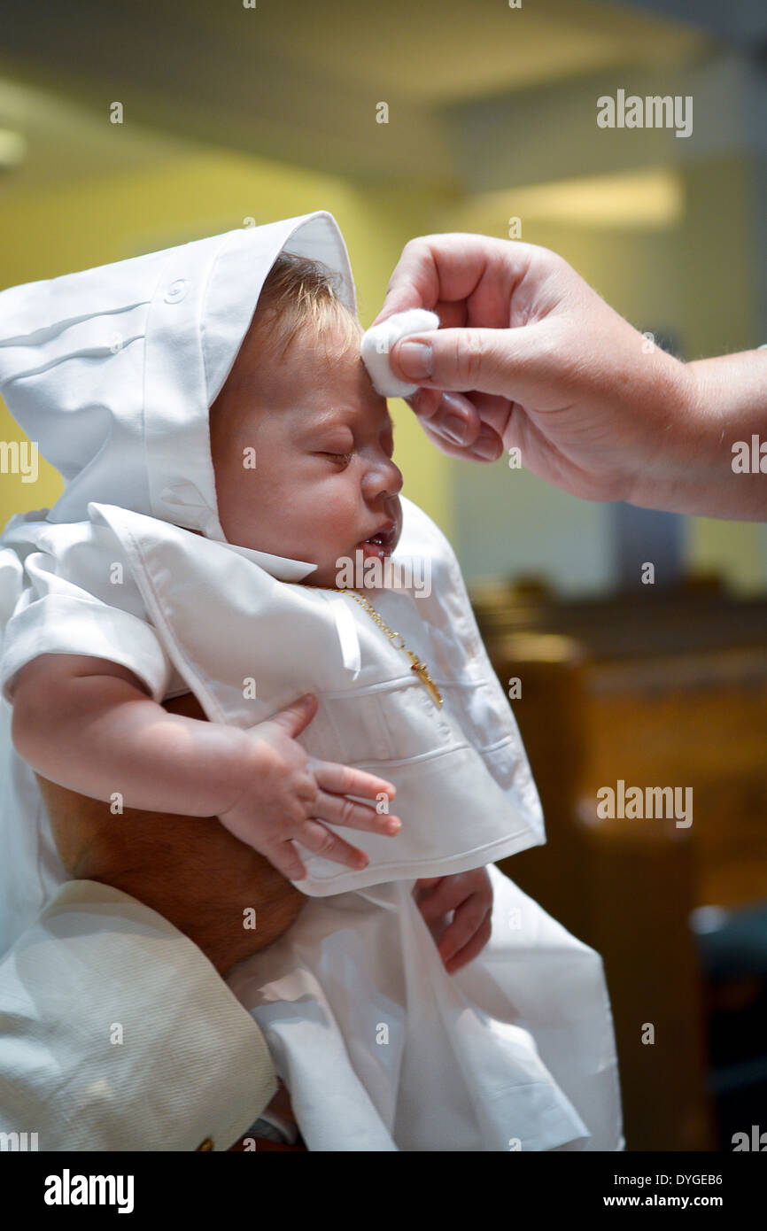 Baptism for 2 month old baby Stock Photo