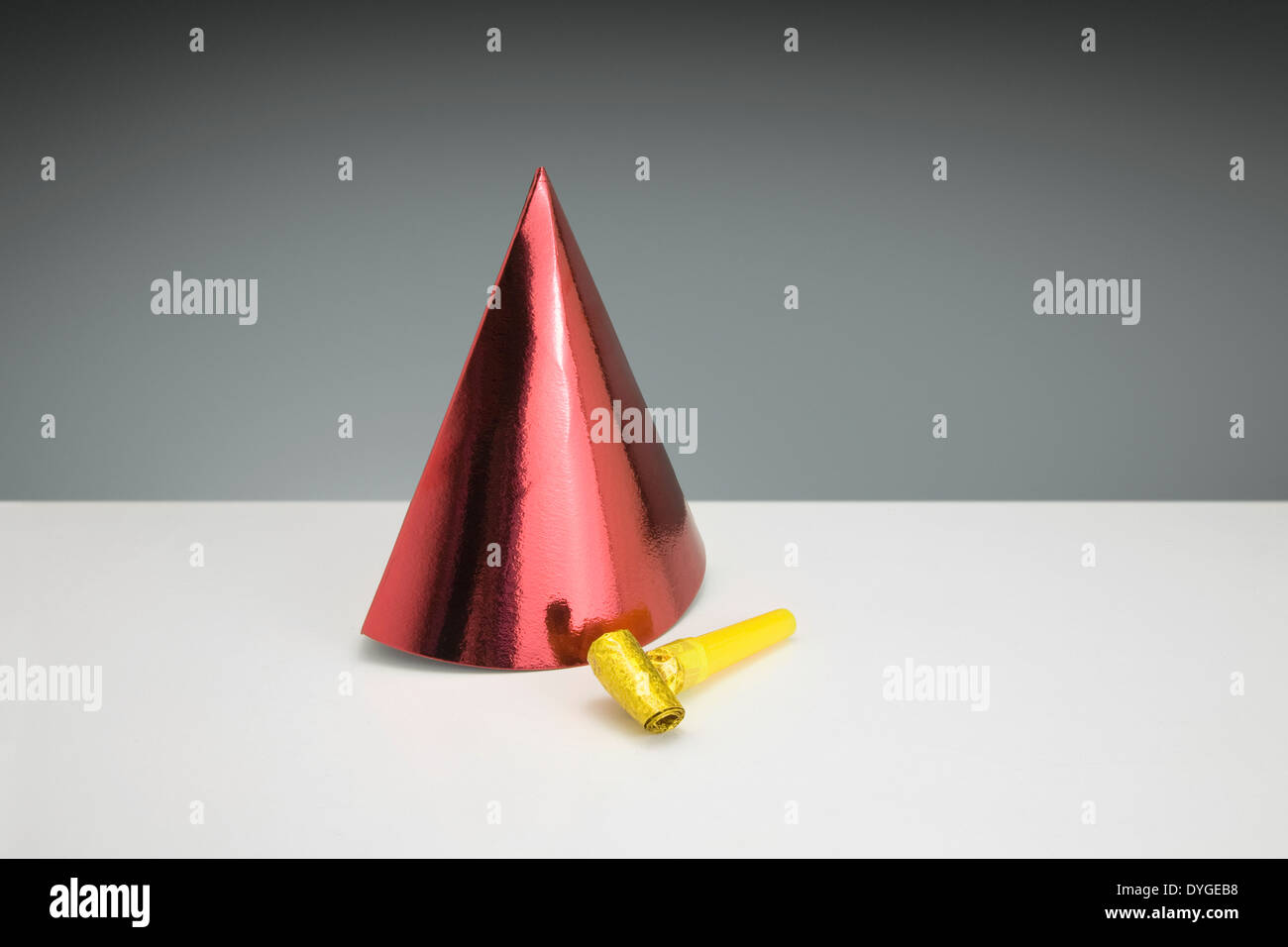 Red Party Hat and yellow Horn Blower party decoration Stock Photo