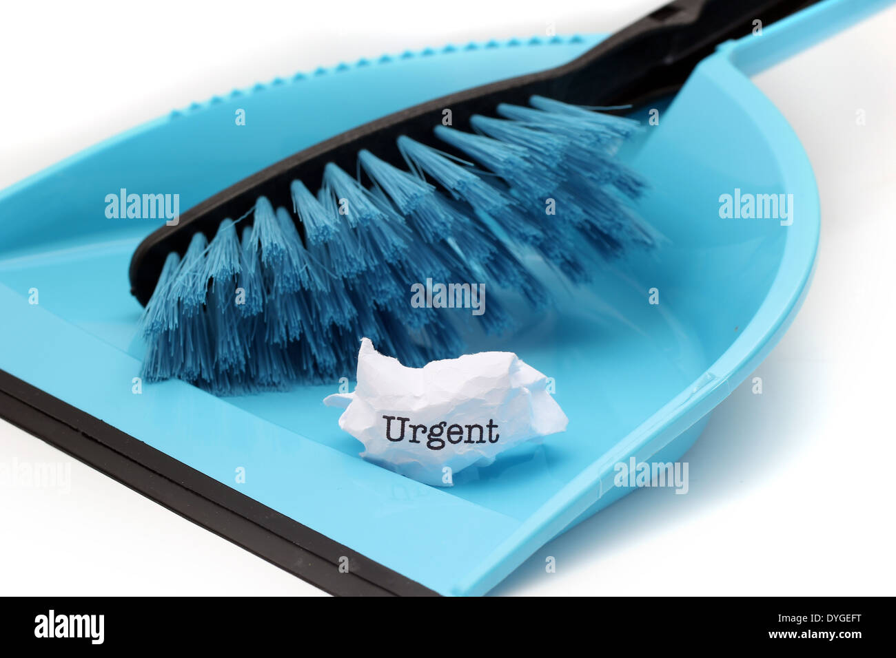 Urgent text on trash Stock Photo