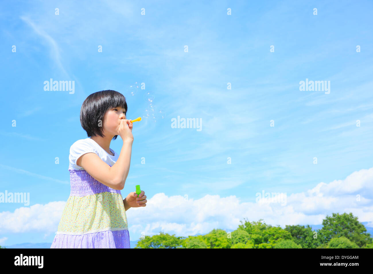 Japanese girl playing in nature Stock Photo - Alamy