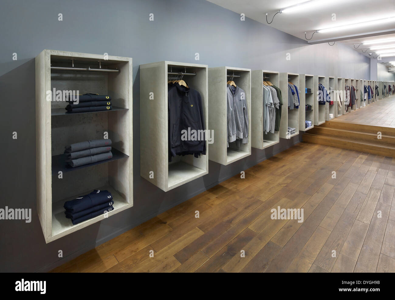 Fred Perry, München, Munich, Germany. Architect: BuckleyGrayYeoman, 2012. Perspective of wall-mounted display units. Stock Photo