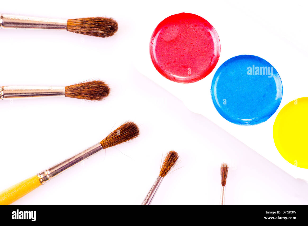 Set of watercolour paints and paintbrushes on white Stock Photo