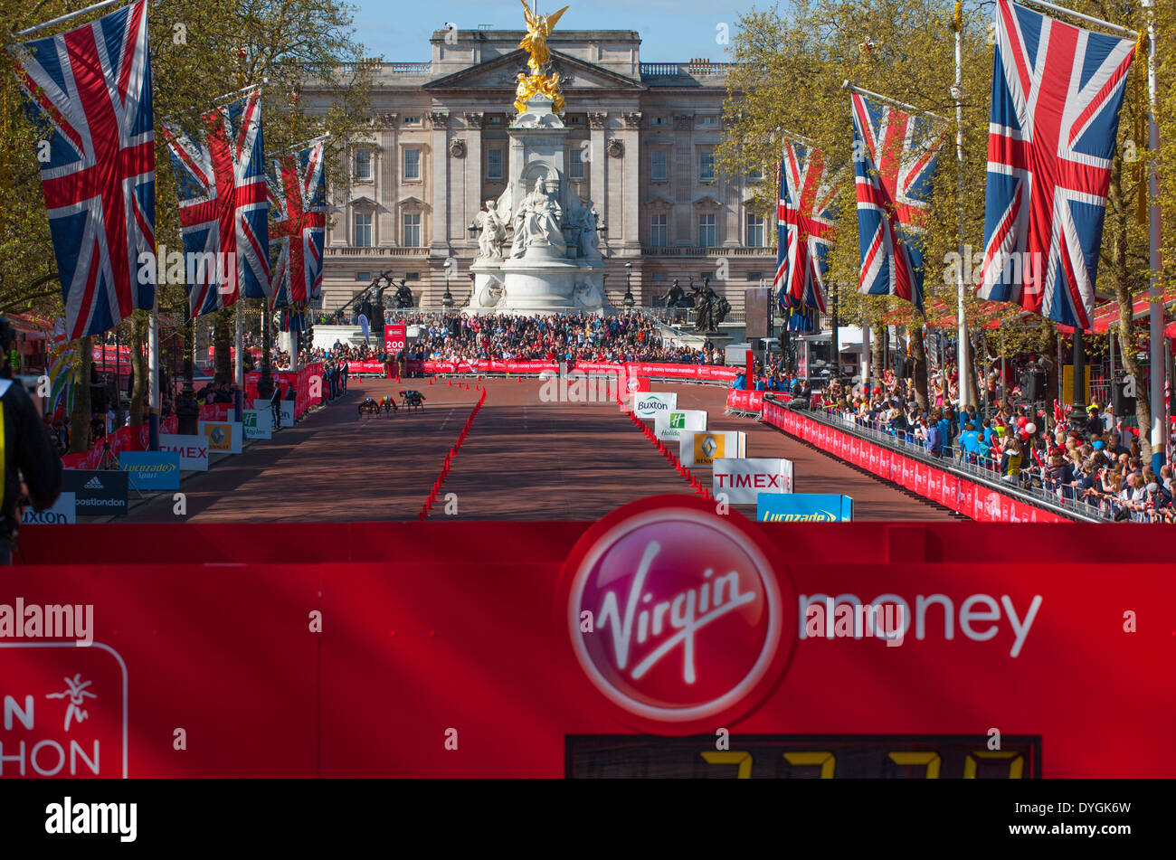 Elite wheelchair athletes racing on the finishing straight of The Mall in the Virgin Money London Marathon 2014 Stock Photo