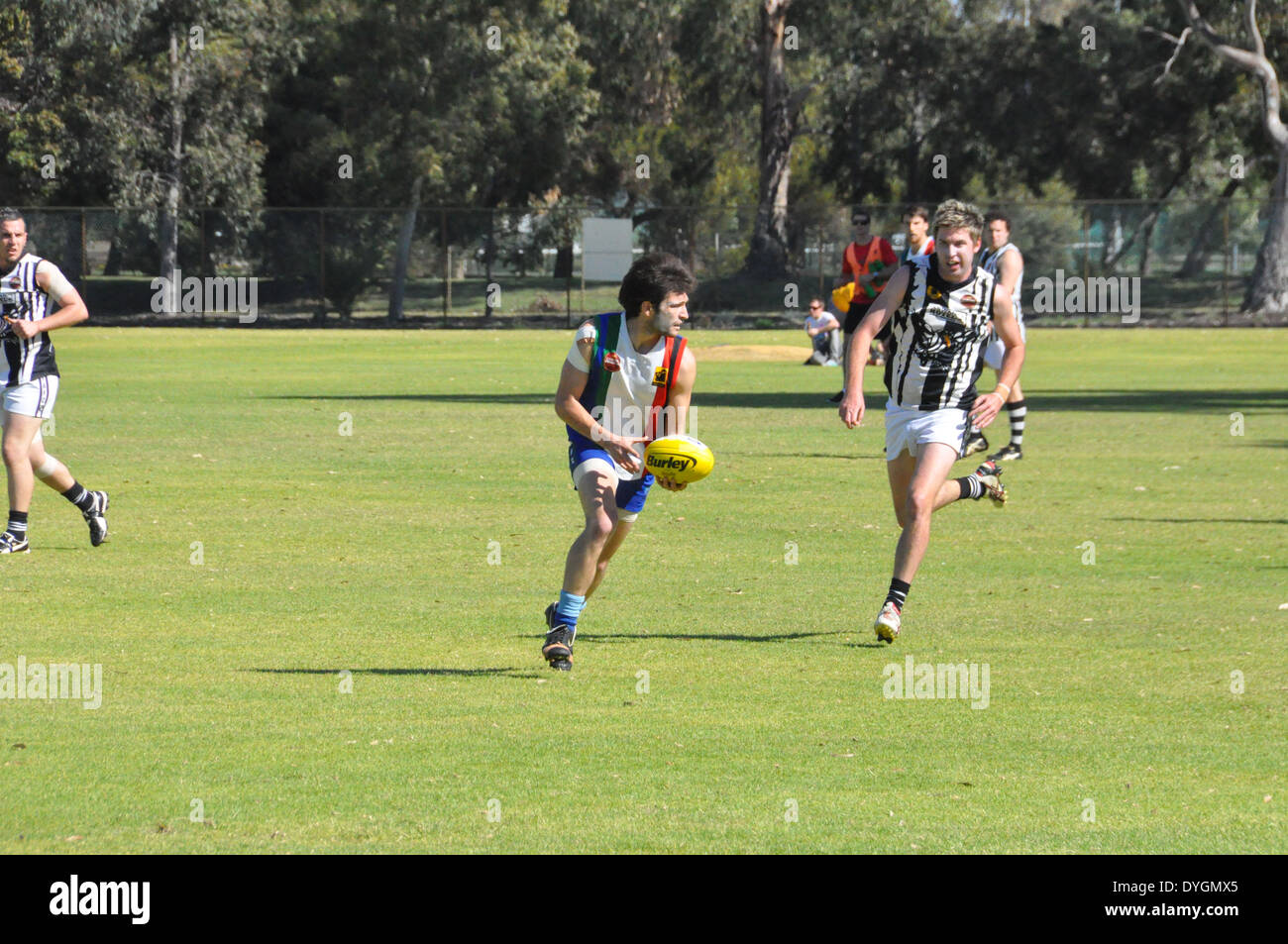 Australian Rules Football being played at amateurs level. Stock Photo