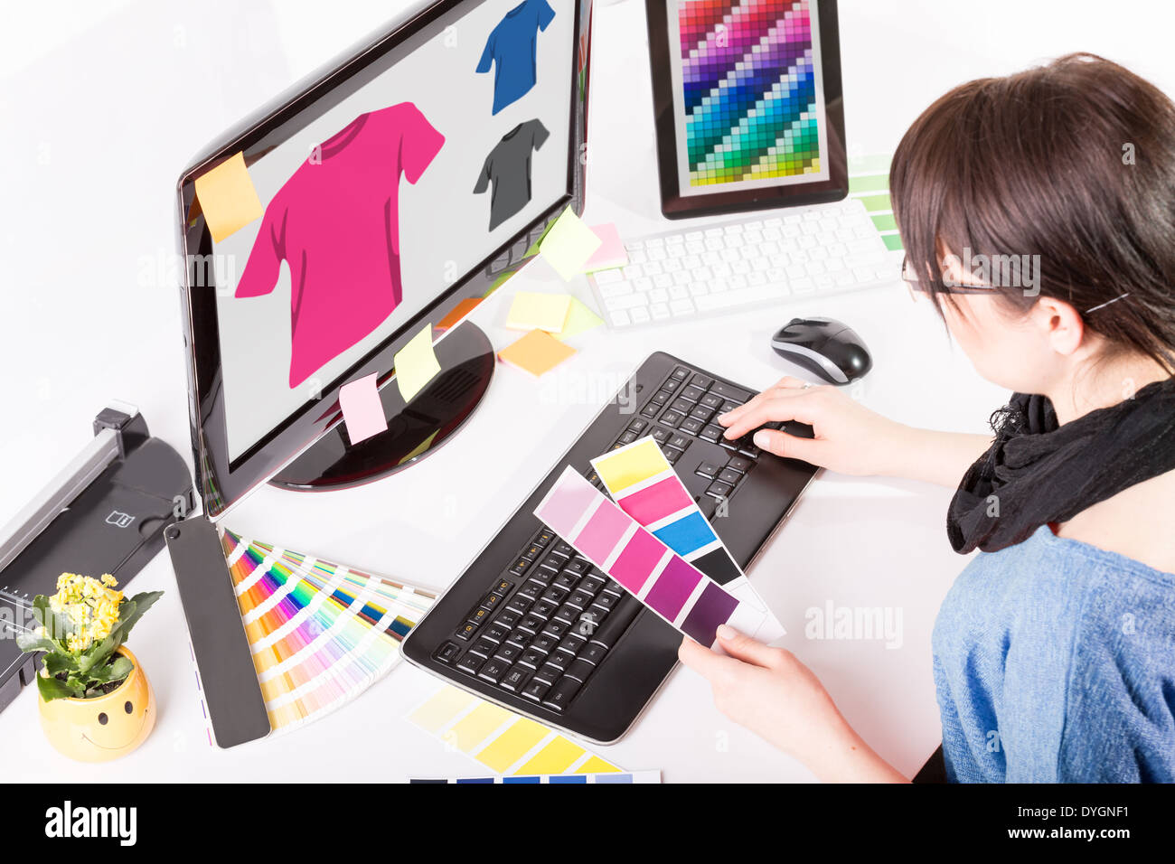 Graphic designer at work. Color swatch samples. Stock Photo