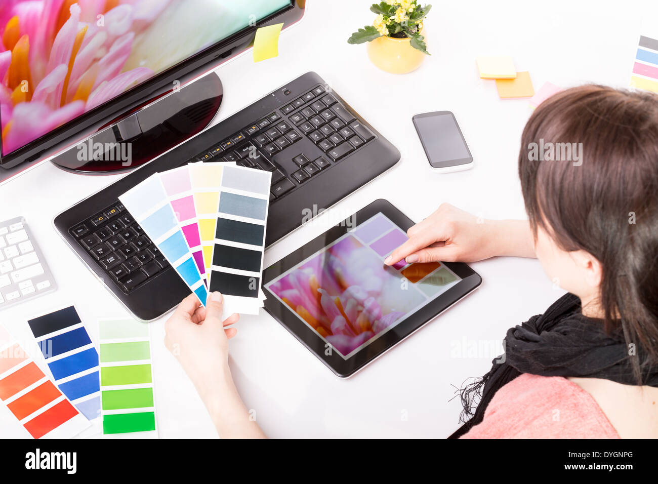 Graphic designer at work. Color swatch samples Stock Photo Alamy